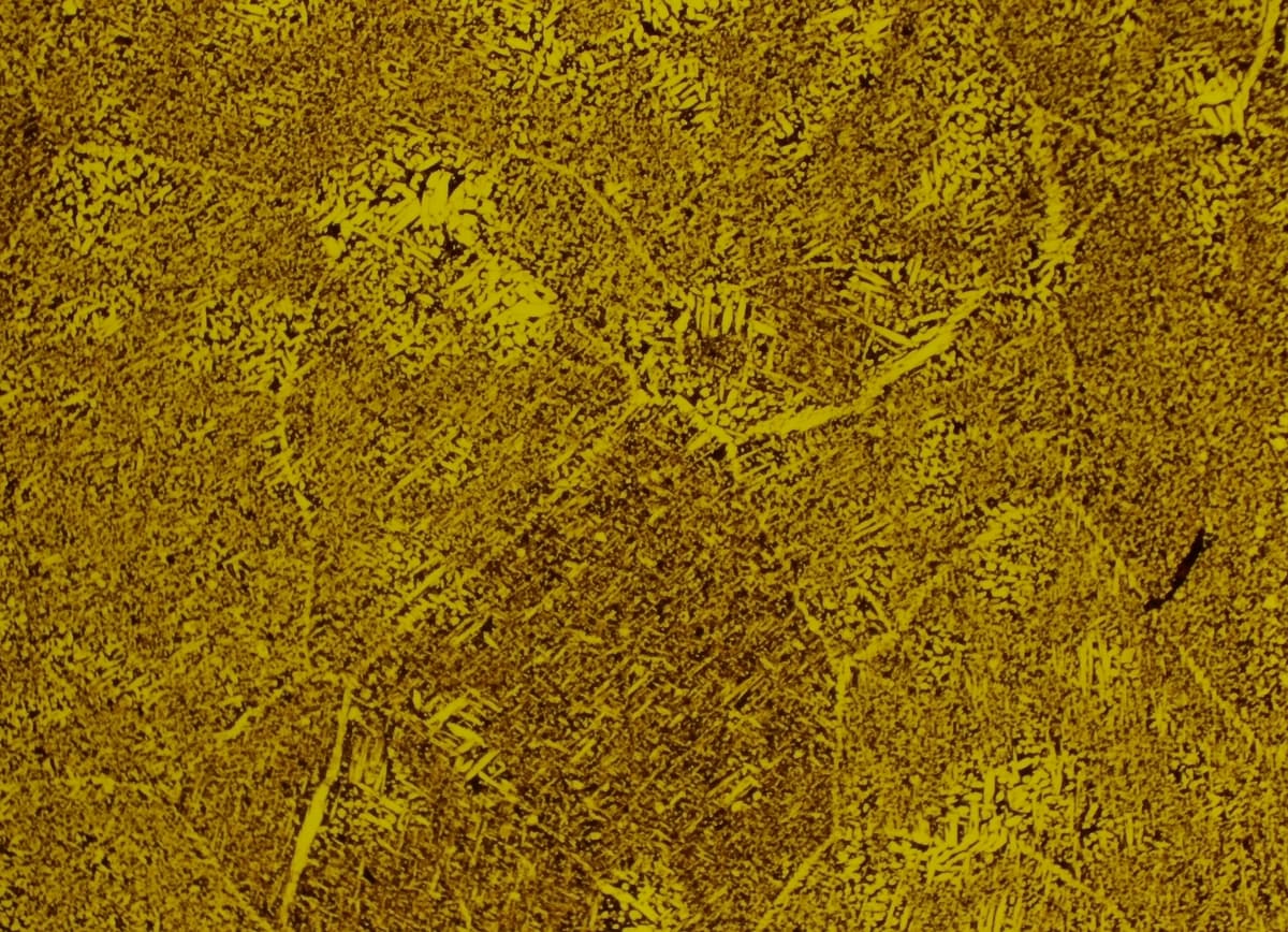 Aluminum-silicon alloy microstructure after proper etching with Keller's reagent, showing grain boundaries and structure at 400X
