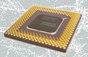 Computer chip cross-section showing multi-layer structure with interconnects and via structures
